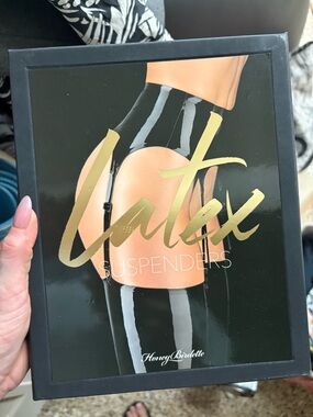 Honey Brigette latex garter belt . Size small 
Never worn.